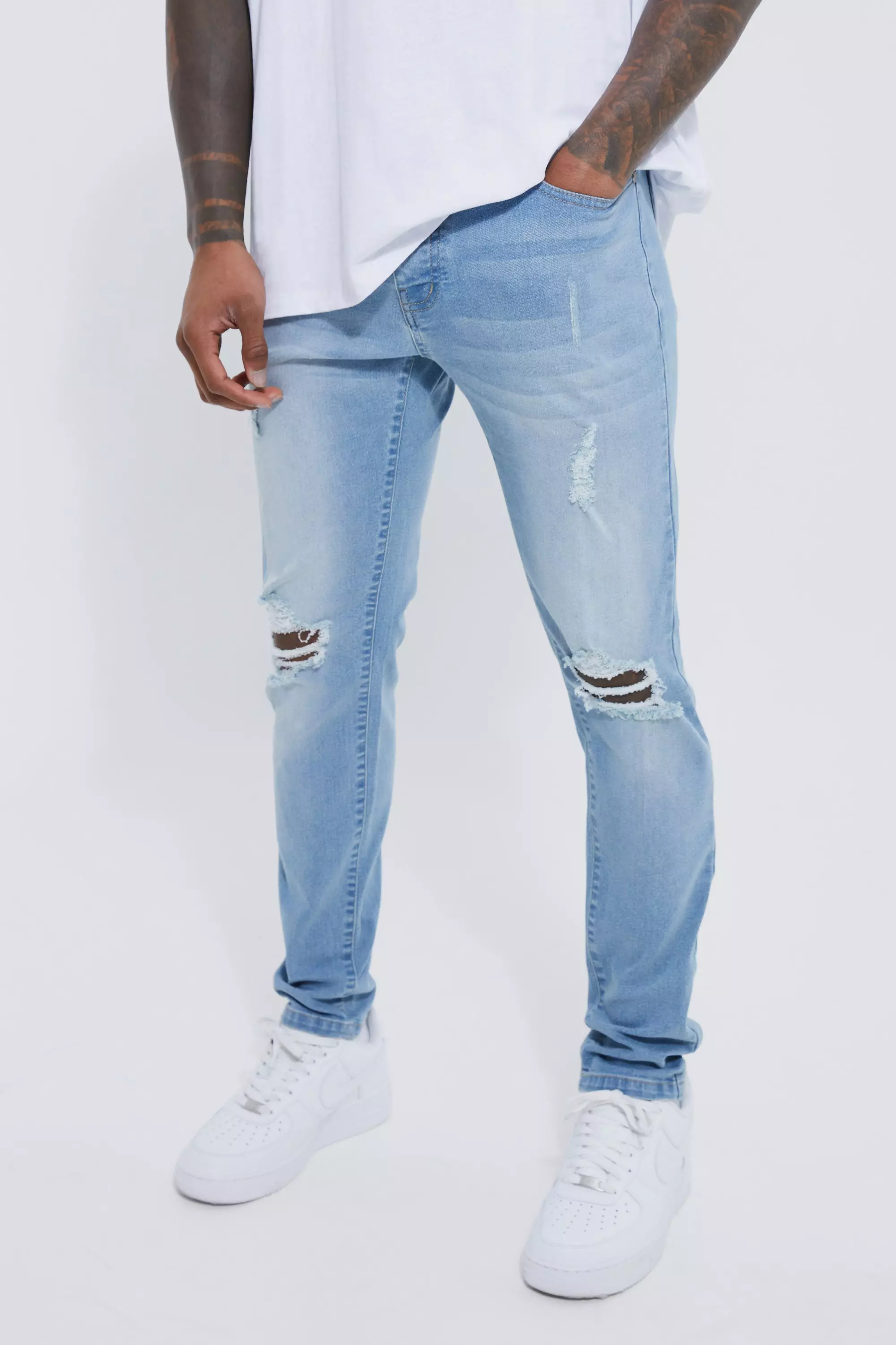 Skinny Stretch Exploded Knee Ripped Jeans | boohooMAN USA